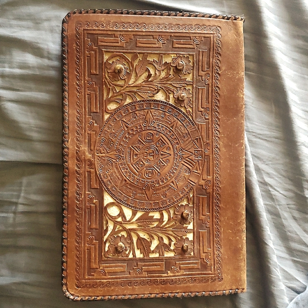 Handmade Leather clutch. Intricate Mexican Incan Aztec tooling. Floral